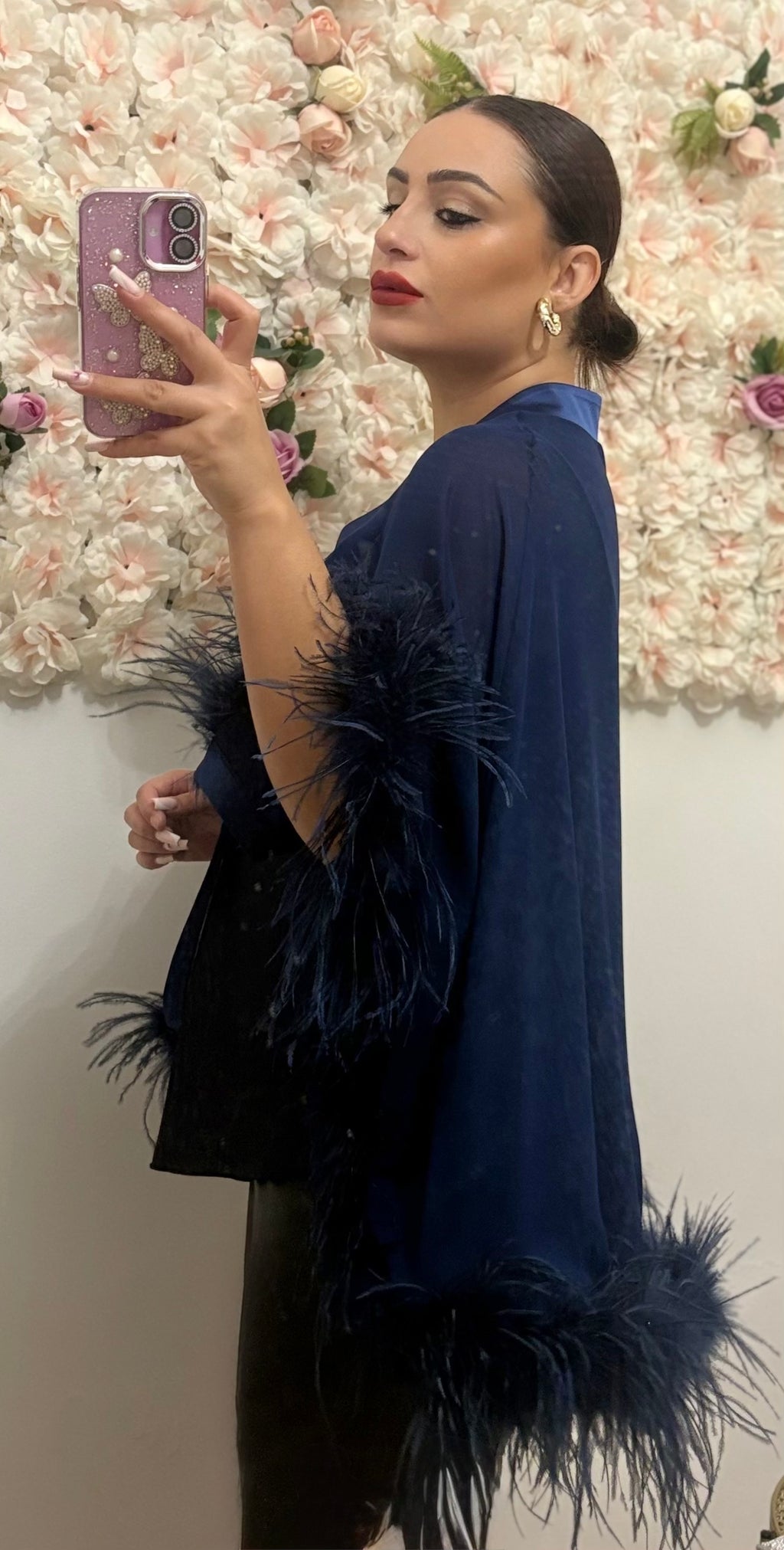 Bolero con bordi di piume