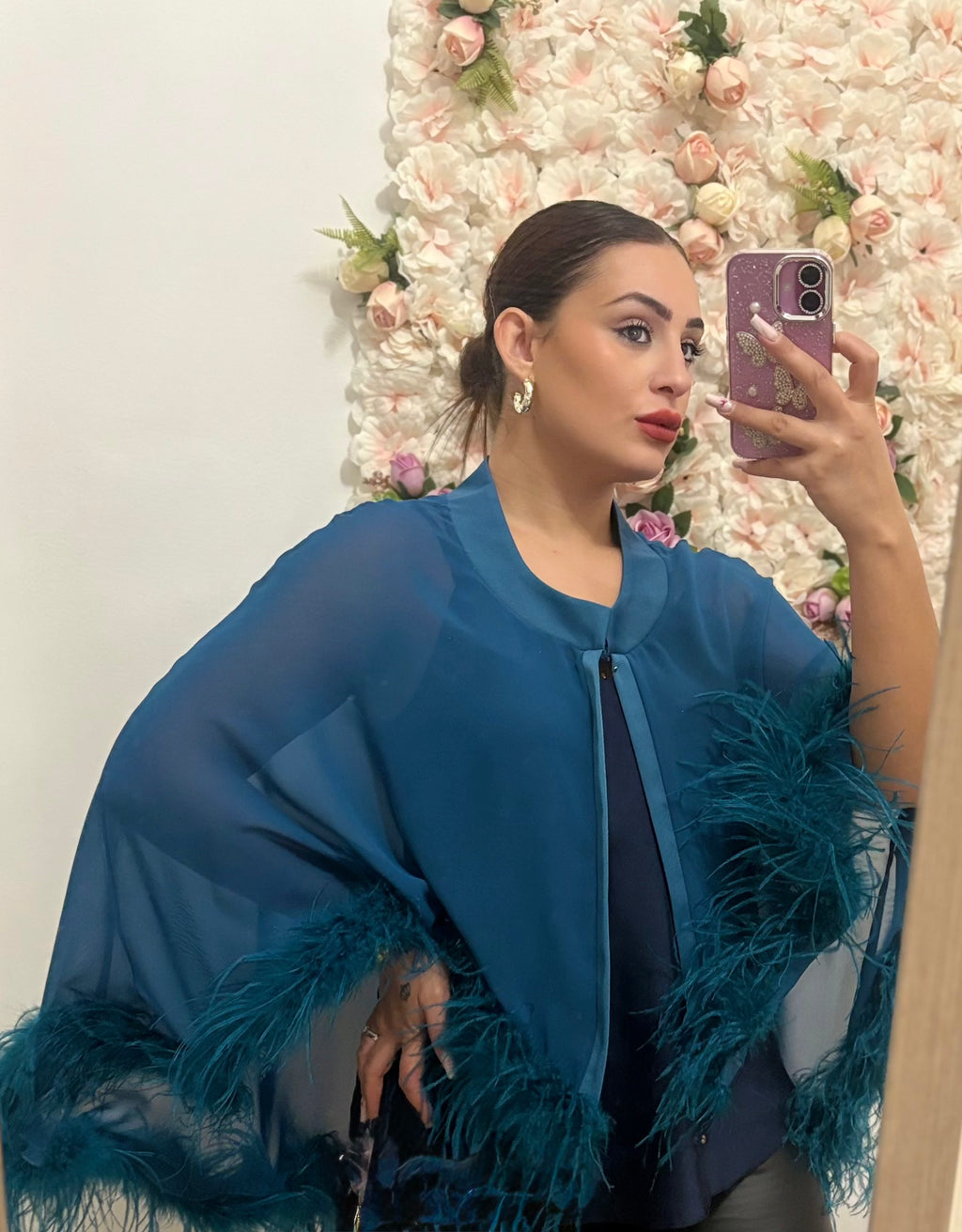 Bolero con bordi di piume