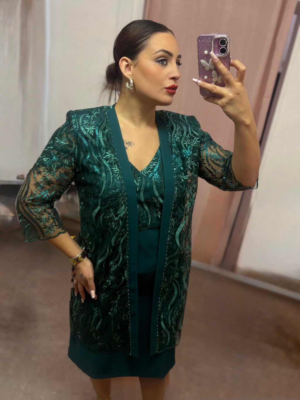 Ensemble verde smeraldo in pizzo e crepe