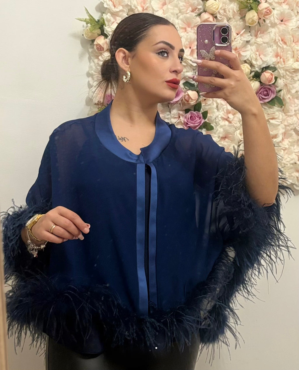 Bolero con bordi di piume