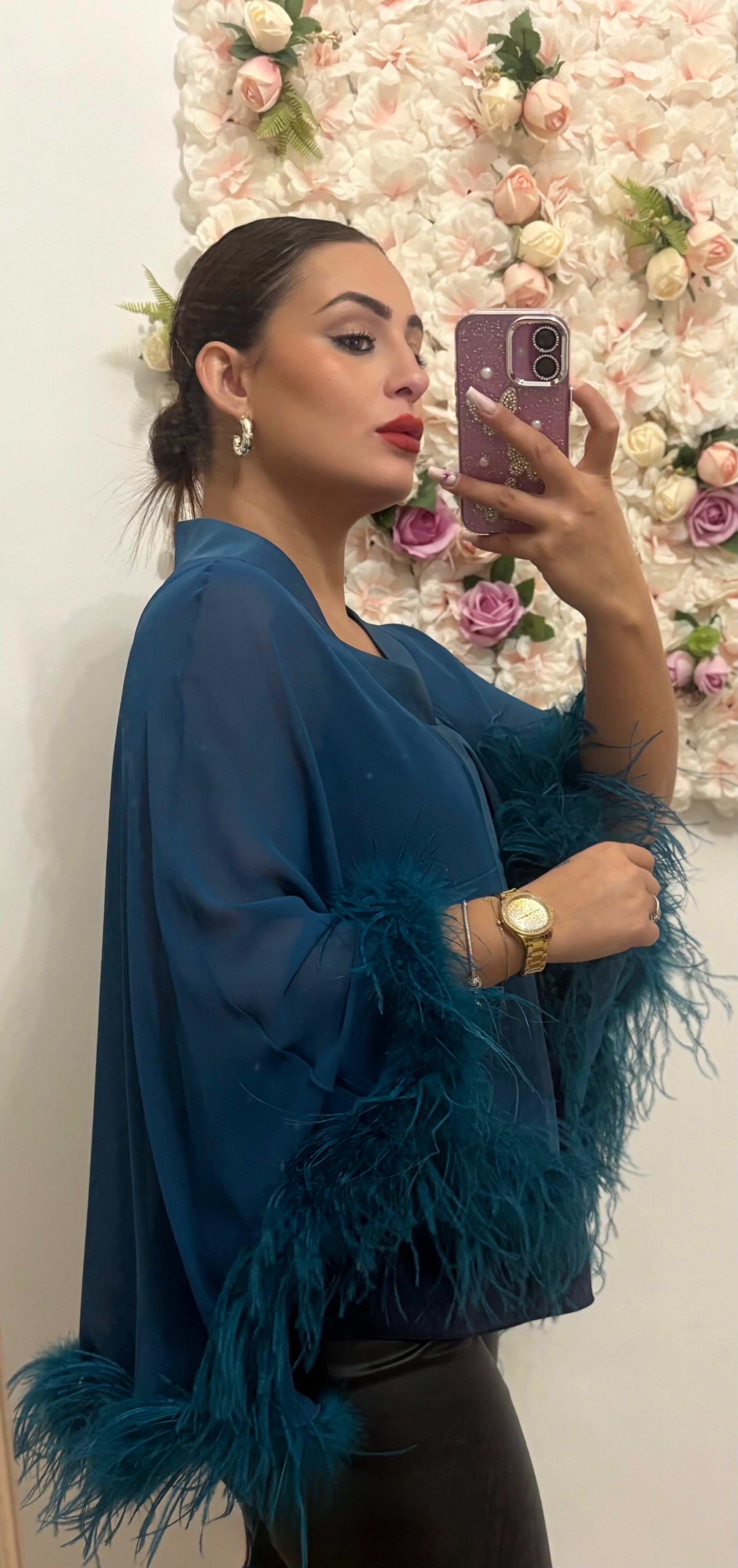 Bolero con bordi di piume